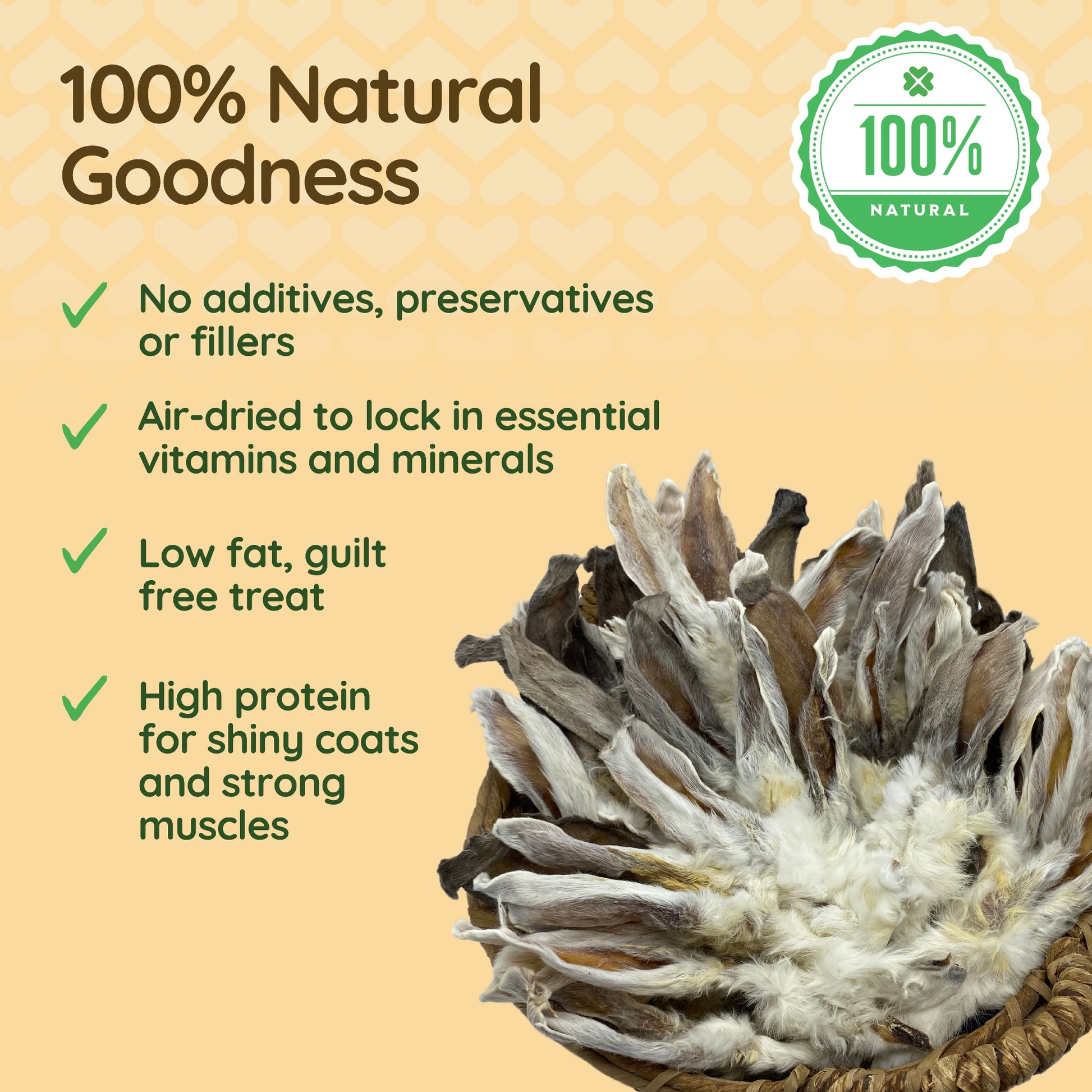 An image shows a basketful of rabbit ears with fur. Caption reads '100% natural goodness'. Bullet points list the benefits: no additives or fillers, air dried, low fat and high protein.